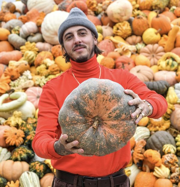 Mitch McCulloch holding a pumpkin
